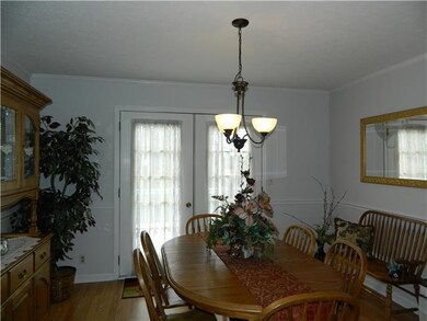 Dining Room with french doors that open to deck