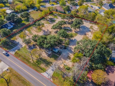 Aerial overview of property's location featuring property parcel outlined