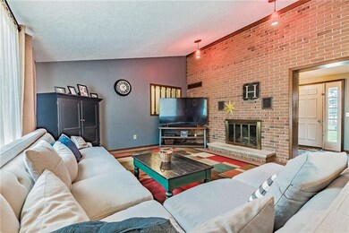 Another angle of living room with fire place