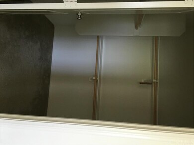 walk-in closet in the master bedroom.