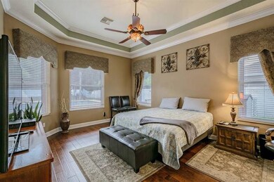 Master Suite overlooks pool area