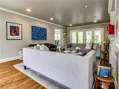 This living area also boasts a wall of windows and