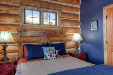 Main level bedroom - the cozy cabin feel is most i