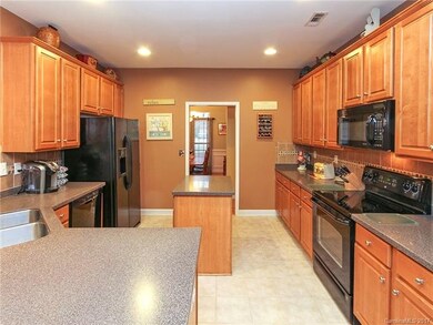 Kitchen open to great room and eat in area.