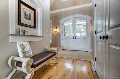 Elegant Entryway, boasts stylish architectural det
