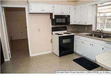 This is a Shot of this very Neat Kitchen and Break
