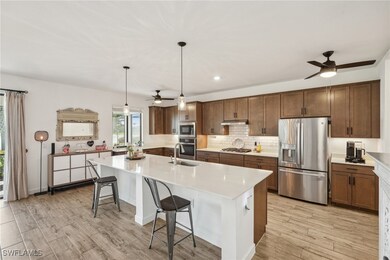 Kitchen with stainless steel appliances, tasteful