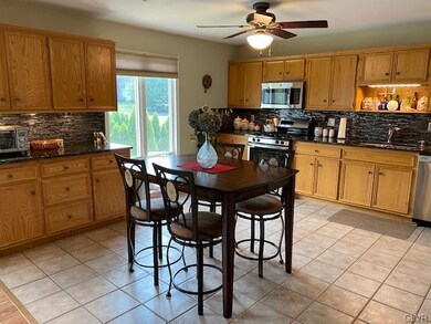 Large and tastefully decorated, this bright kitche