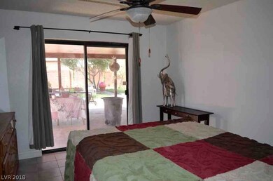 Master Bedroom has view of beautiful backyard and