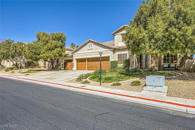 View of front of property with driveway, stucco si