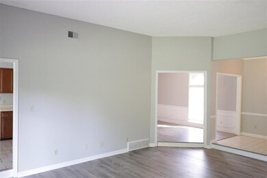 Looks into entry and dining
