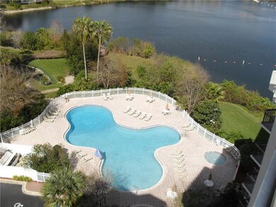 VIEW OF POOL & LAKE FROM TERRACE BALCONY