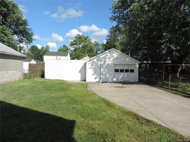The back yard & garage area.