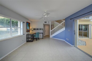 Living Room with Sliders to Screened Patio