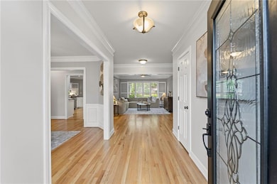 A welcoming front entry with updated lighting and 