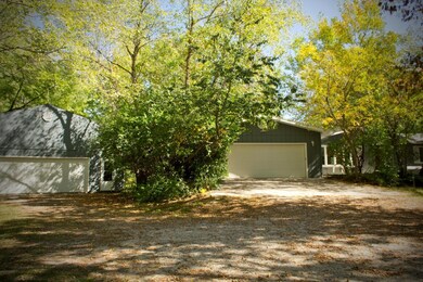 Front of home and outbuilding