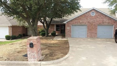 Single story home with a garage
