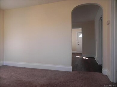 Charming character with arched opening from living