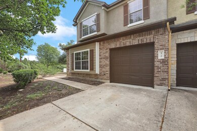 View of front of property with brick siding, stuc