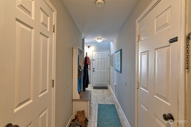 Coming in from the front door, garage door to the left.