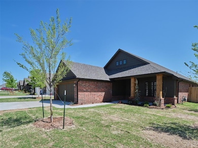 View of front of property featuring roof with shin