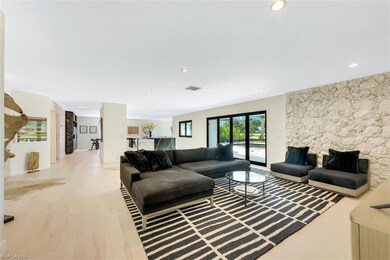 Family Room With Stone Feature Accent Wall!