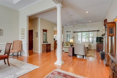 Foyer opens to dining and great room.