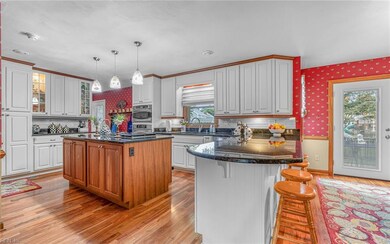Kitchen renovation includes two-toned cabinets wit