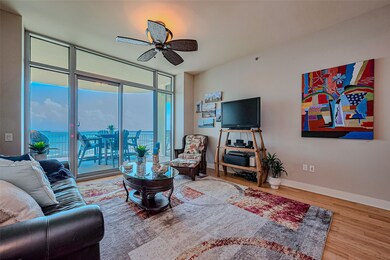 Large den area with 10 ft ceilings and bamboo floo