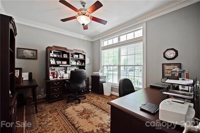 Home office with French doors to the right of the 