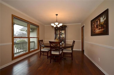 Spacious dining providing engineered wood flooring