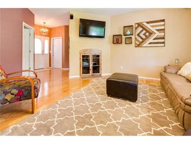 Living Room. When you walk in the front door, you step into the living room that is open with lots of light.