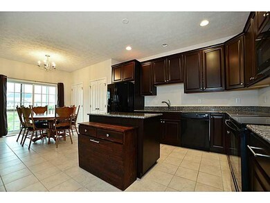 Kitchen. Kitchen opens to sizable Breakfast area w