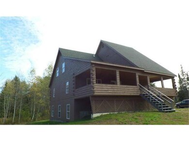 Exterior Back. Rear view from woods