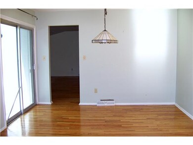 Dining Room. Sliders to concrete patio. Living, di
