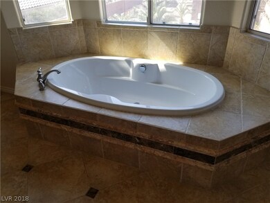 Huge soaking tub which has a beautiful view to the