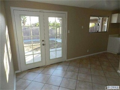 Nook Area with French Doors Leading to Backyard