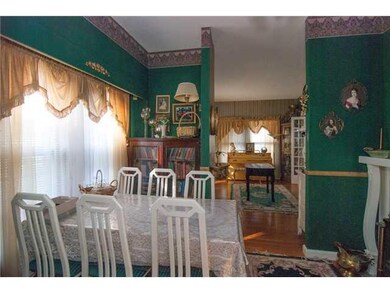 Dining Room. Hardwood floors, fireplace, built in 