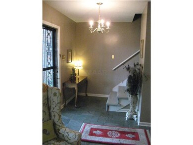 Entry Hall with slate floors off of hardwood floor