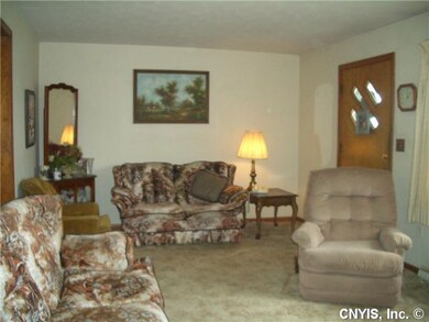 Living Room hardwoods under all carpets
