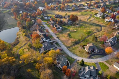 Aerial of house in the golf course community