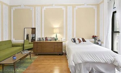 Bedroom featuring wood finished floors