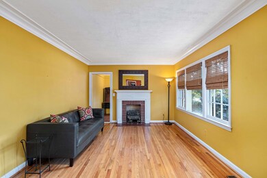 Living Room with lots of light & beautiful floors