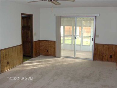 lr view from front entry to sun room & main flr la
