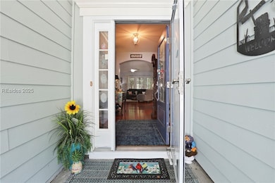 Entry has side light window, solid front door with