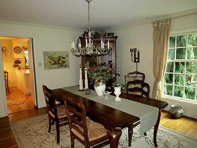 Dining Room. The formal dining room includes rich 