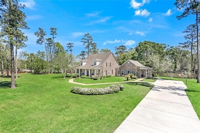 Oversized front yard and driveway. Suite on right