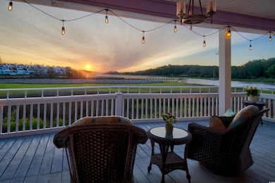 Deck at dusk with a water view