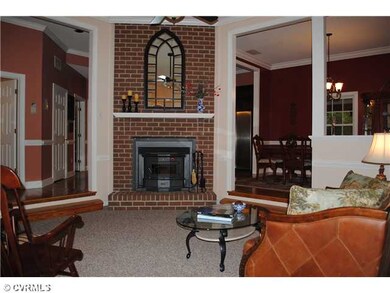 Living Room - Sunken living room with brick wood-b