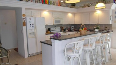 Kitchen and Breakfast bar - lots of lighting.